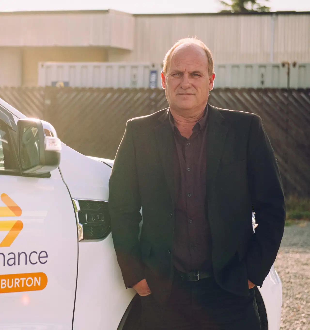 Leon Cameron from MTF Finance Ashburton standing beside a company vehicle