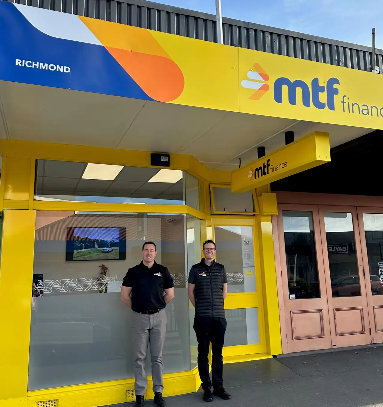 The team at MTF Finance Richmond outside their office